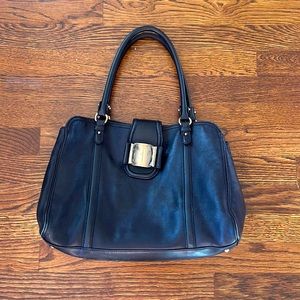 Salvatore Ferragamo black leather purse.